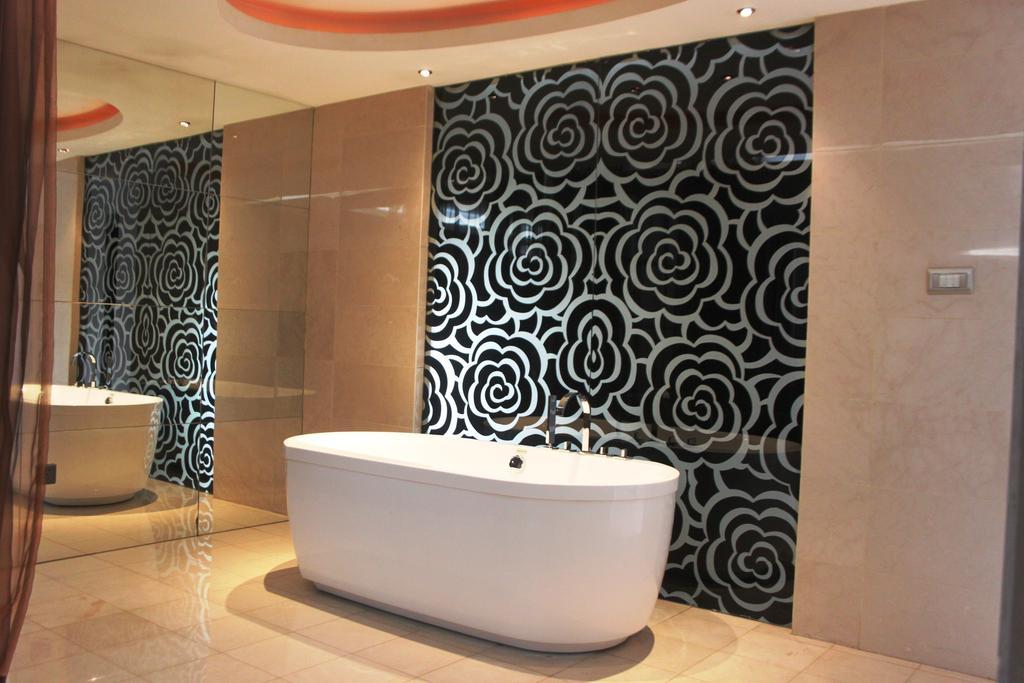 Harbin Yakelai Holiday Hotel Номер фото